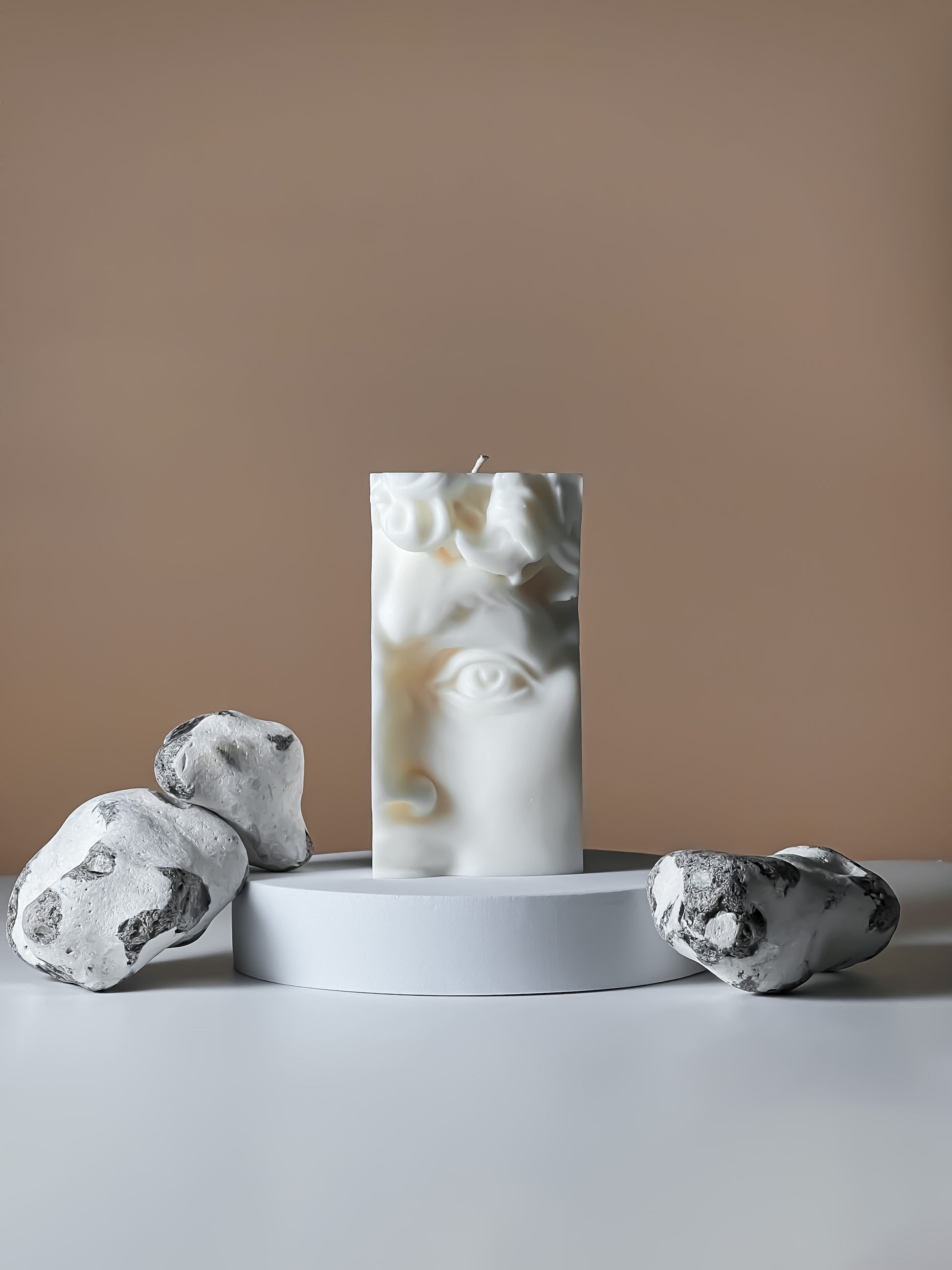 Experience the soothing ambiance of our Half Face David candle. Perfect for gifting or adding a touch of elegance to your home decor. Shop now for a calming and stylish addition to any space.