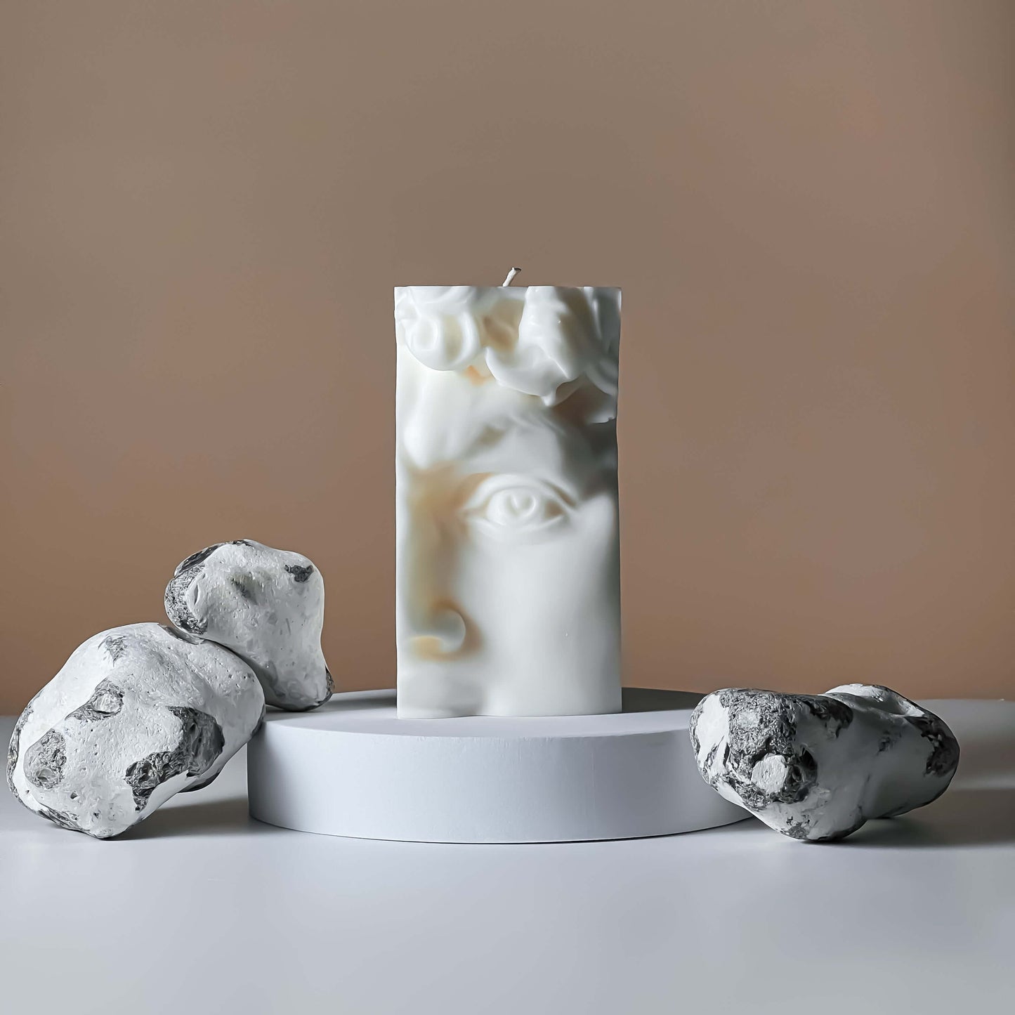 Experience the soothing ambiance of our Half Face David candle. Perfect for gifting or adding a touch of elegance to your home decor. Shop now for a calming and stylish addition to any space.