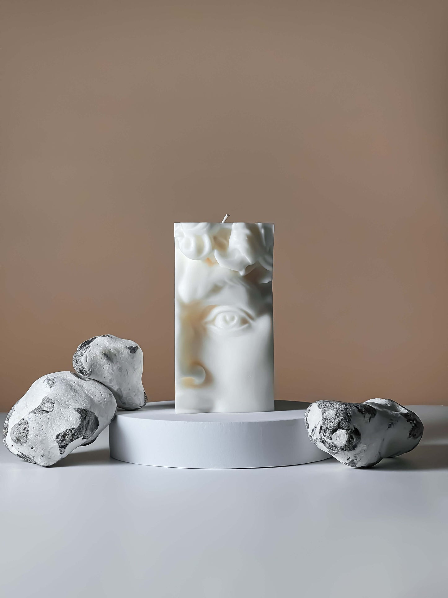 Experience the soothing ambiance of our Half Face David candle. Perfect for gifting or adding a touch of elegance to your home decor. Shop now for a calming and stylish addition to any space.