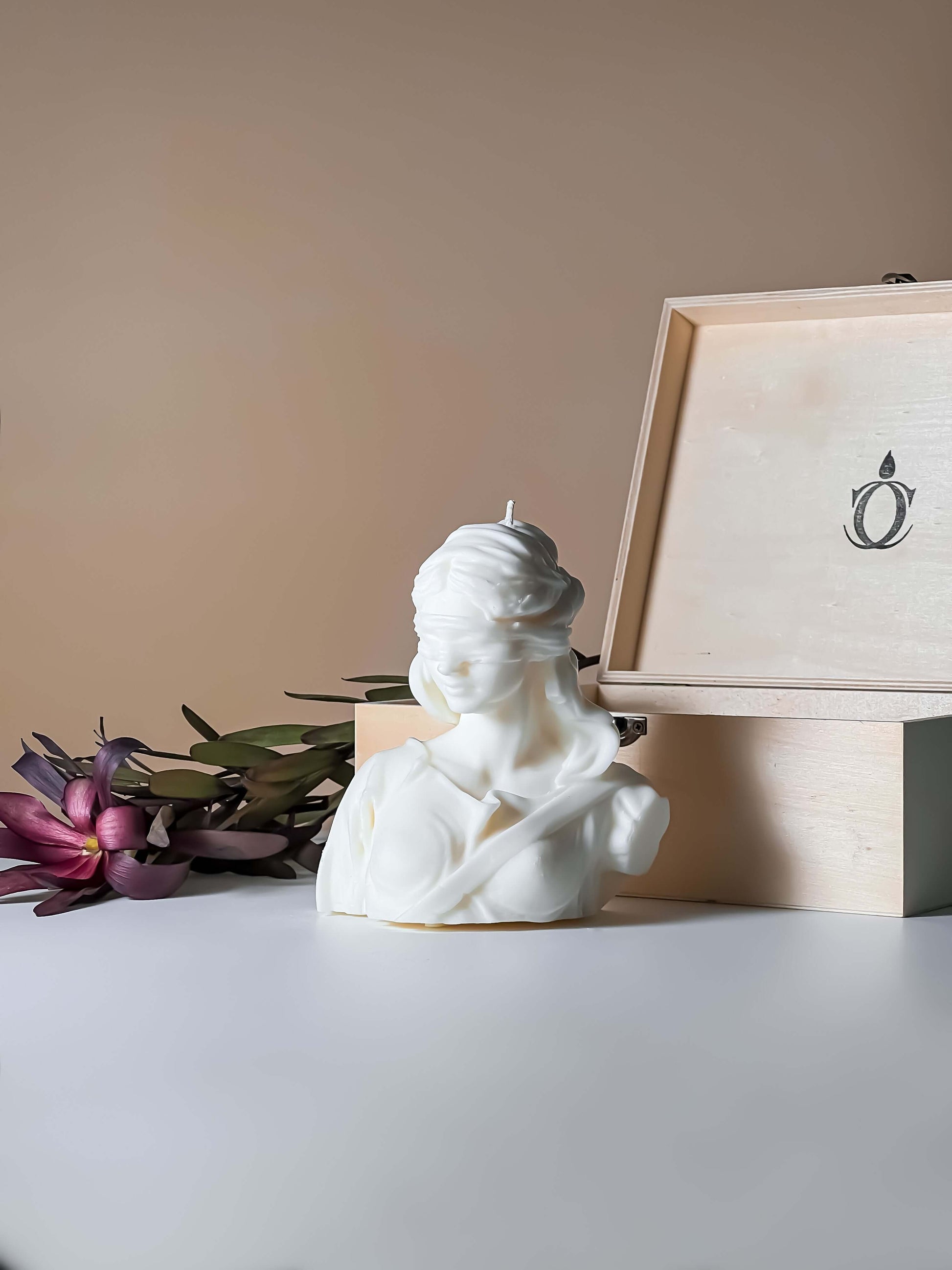Elegant Lady Justice candle sculpture featuring a blindfolded female figure symbolizing impartiality and fairness, crafted in premium wax with detailed artistry. Perfect as a decorative accent piece, gift for legal professionals, or meaningful home decor