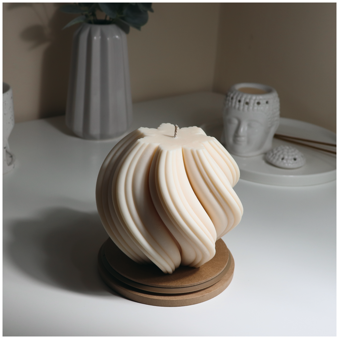 Experience the magic of our Large Snow Flake Swirl Candle, perfect for gifting and adding a touch of elegance to your home decor. Shop now for a delightful ambiance!
